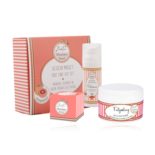 Badefee foot care gift set with striped box, bottles, and jar on a white background