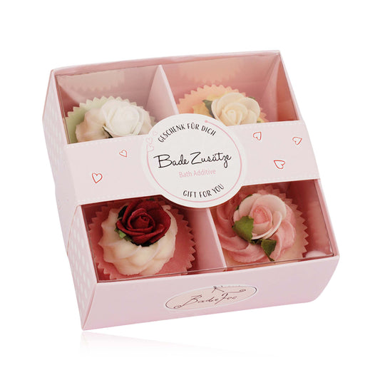 Badefee set of rose-shaped bath bombs in a pink box with a decorative label.